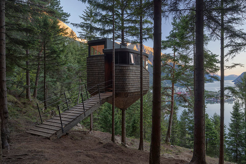 floating cabin in the forest with lake view
